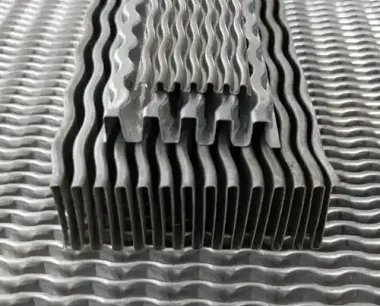 Oil cooler fin machine for aluminum heat exchangers