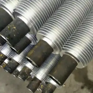 Extruded fin tube machine